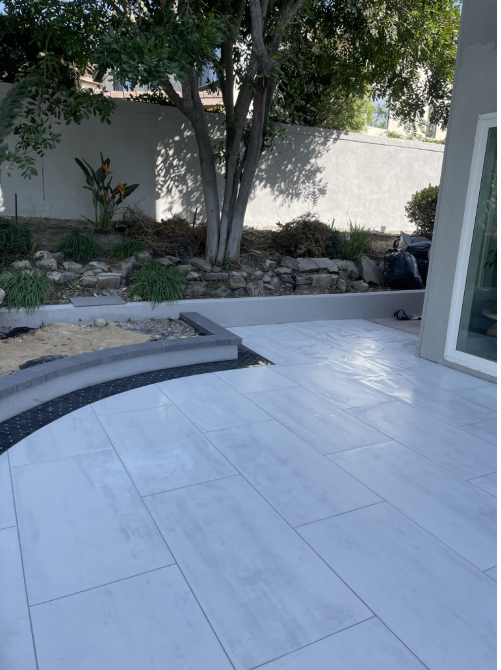 Large-Format White Tile Patio